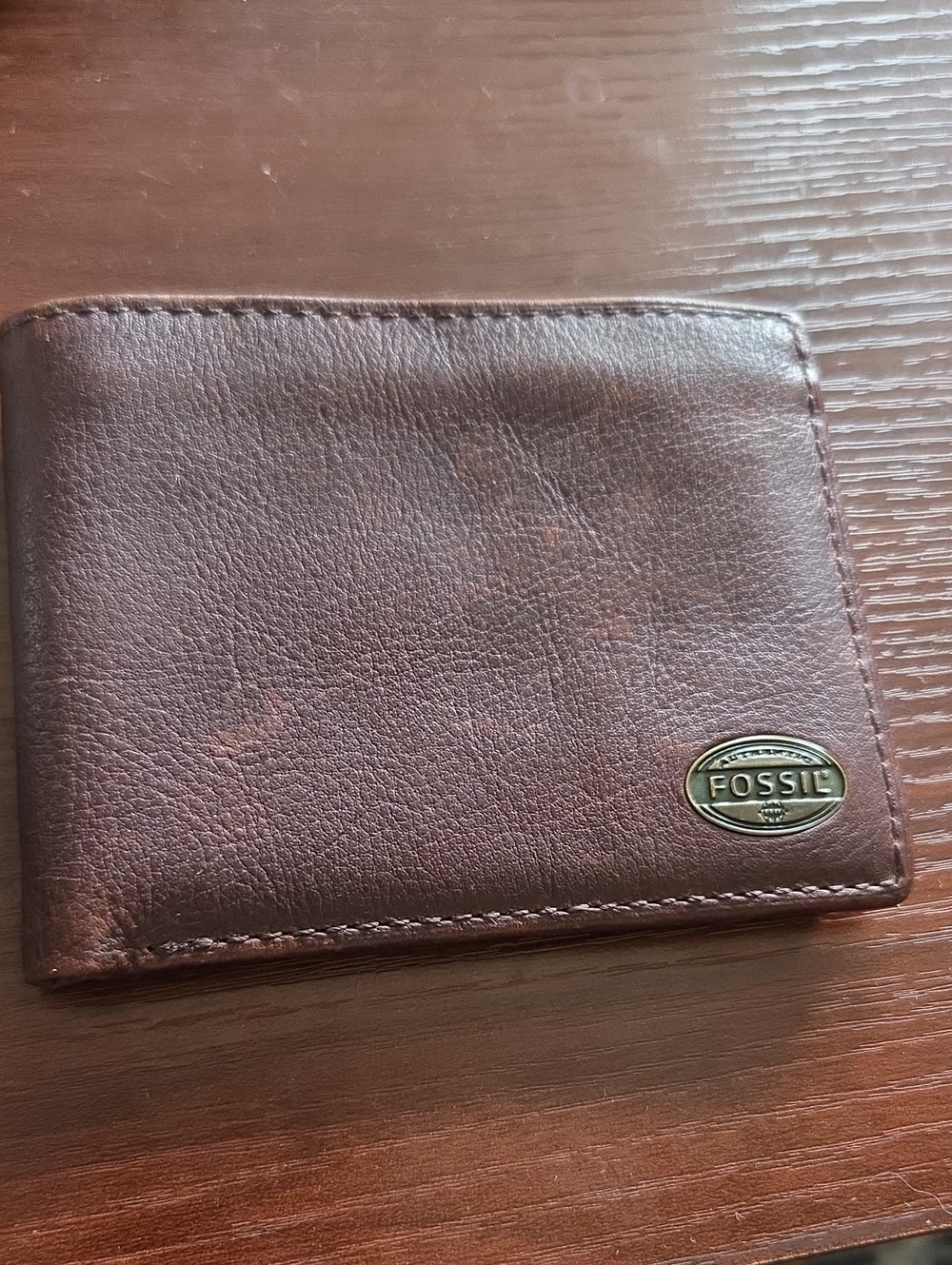 Fossil Men's Dark Brown Leather Bi-Fold Wallet with Logo Plaque